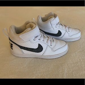 Boys Nike white high tops, brand new without tags.
